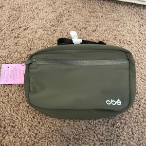 NWT Obe  nylon waist pack, with free month of classes code on tag, olive color